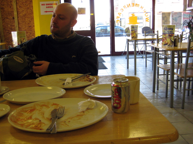 Tom relaxes after a much larger than ordinary Lunch